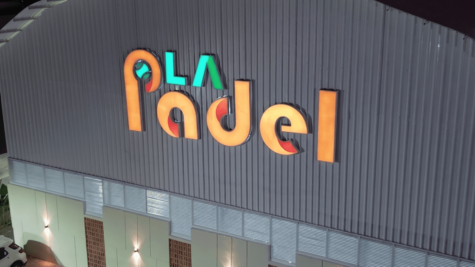 Padel players on a glass court at Lapadel lifestyle hub